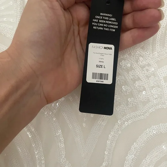 Fashion Nova Ivory Beaded V-Neck Wedding Gown with Feather Shoulders - Picture 6 of 9